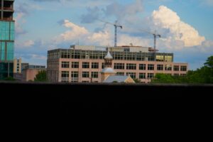 Church steeple and construction cranes in Downtown Austin, Texas